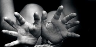 Hands tied with rope