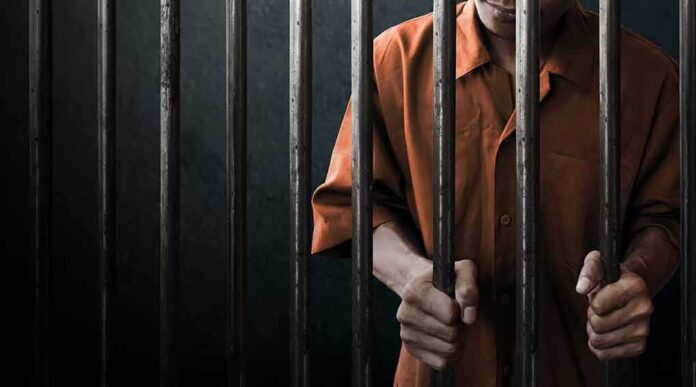 744470836 featured image Man behind bars