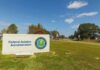 Federal Aviation Administration sign on grassy lawn