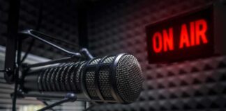 Microphone in studio with On Air sign