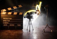 Film set with clapperboard camera,and lighting