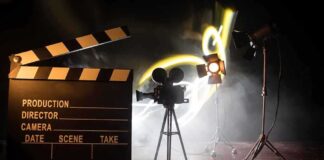 Film set with clapperboard camera,and lighting