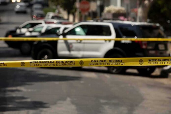1980603047 featured image Police tape blocking street with patrol cars