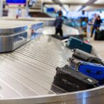 Airport PANIC — Mysterious Smell Hits Flights Luggage on airport baggage claim conveyor belt