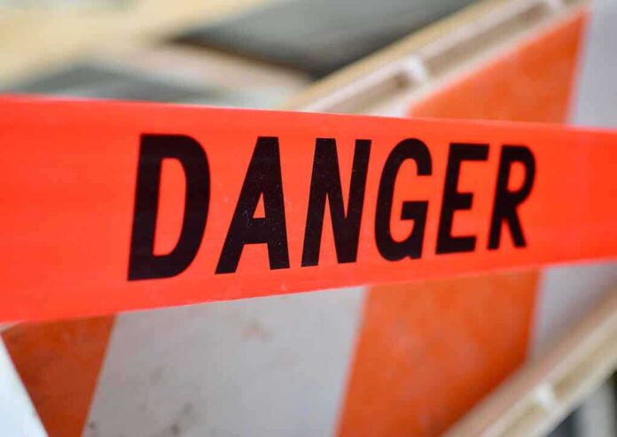 359320793 featured image Red tape with the word Danger printed
