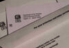 IRS letters and envelopes on a table