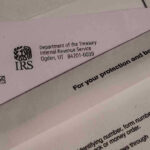 IRS letters and envelopes on a table