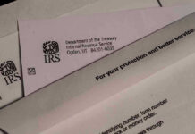 IRS letters and envelopes on a table