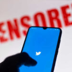 Phone displaying Twitter app