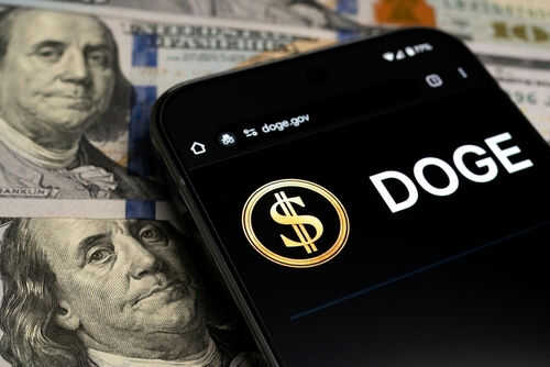 Smartphone displaying Doge logo on hundred dollar bills
