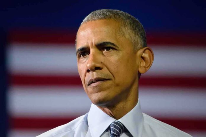 Close-up of a serious-looking man in front of an American flag