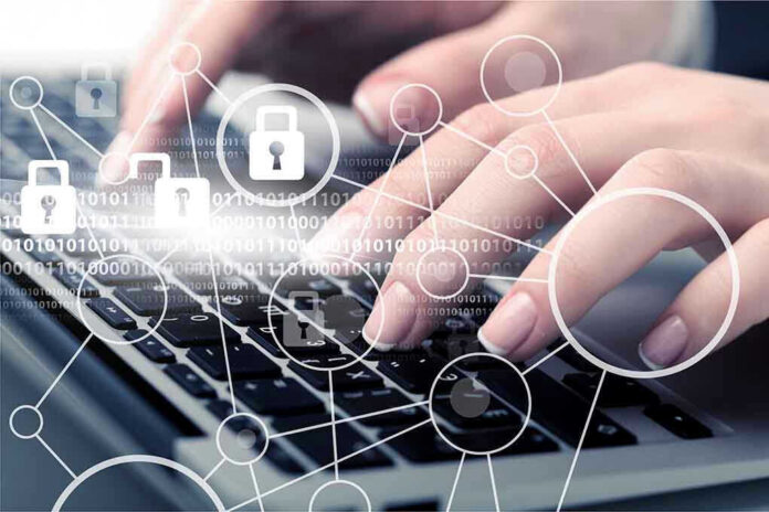 Hands typing with cybersecurity icons overlay