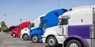 A lineup of colorful trucks parked in a lot