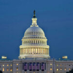 Congress Property SCHEME Exposed – Families Getting RICH! U.S. Capitol building illuminated at dusk.