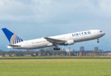 United airplane taking off from a runway.