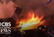 Police Officers HURLED by Explosion - Then Charged Back In