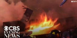 Police Officers HURLED by Explosion - Then Charged Back In