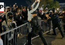 Protesters clash with police outside immigration detention center in New Jersey