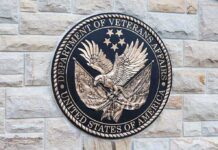 Bronze emblem of the Department of Veterans Affairs featuring an eagle and stars