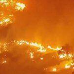 Firefighters battle one of Spain's biggest-ever wildfires