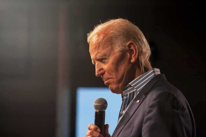 elderly man holding a microphone on stage