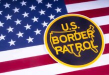 U.S. Border Patrol emblem on American flag
