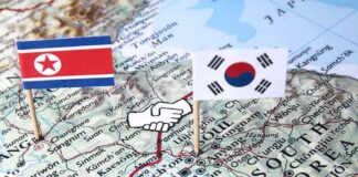 Map of Korean Peninsula with North and South Korean flags and handshake icon