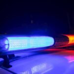 Arrest Warrant Issued For Presidential Candidate After Court No-Show Police car light bar flashing blue and red at night