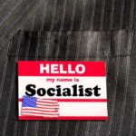Name tag on a pinstripe suit jacket pocket