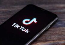 smartphone displaying the TikTok app logo on screen