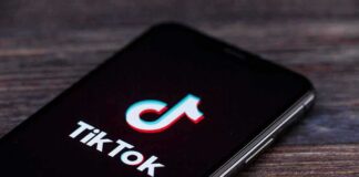 smartphone displaying the TikTok app logo on screen