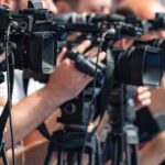 Boebert RAGES At Fox News Host On-Air! television cameras on tripods at a media event