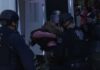 Outside Republican midterm convention, 2 anti-Trump protesters arrested