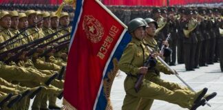Military parade with soldiers marching; Pham Van Dong, Zhang Jun, Zhang Yufeng, Norichika Aoki, Andreas Hestler, Jonathan Cyprien not visible