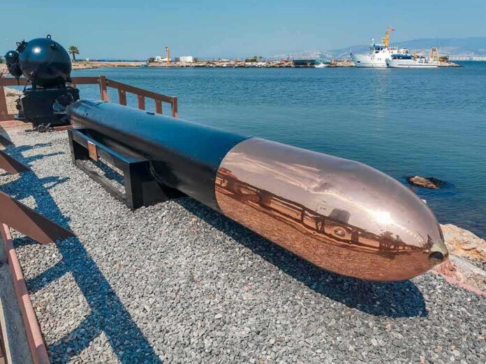 Naval torpedo on display by the waterfront