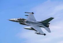 F-16 CRASHES Into U.S City – Town Evacuated Fighter jet banking in the sky