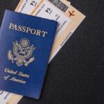 Trump Changes Create Sudden Passport Frenzy US passport with boarding passes on a dark surface