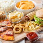 Patriot Milkshake Frenzy Sparks Cash Surge Assorted fast food on a wooden board