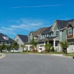 Row of suburban houses along a curved residential street
