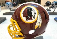 NFL Team Revives Former Name Six Years After Abandoning It maroon football helmet with yellow facemask on display
