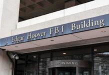 FBI Boss Charged Under Espionage Act Entrance of the J. Edgar Hoover FBI Building