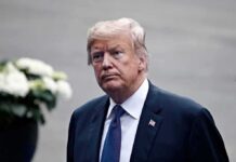 Text War Erupts: Trump Blasts RINO man in a suit with an American flag pin