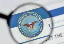 Pentagon Power Play: New Fortress Bidding War magnifying glass focusing on U.S. Department of Defense seal