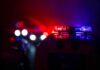 Oprhans Tormented to DEATH – House Of Horrors Exposed Police car light bar flashing red and blue at night