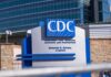 CDC headquarters sign outside modern office buildings