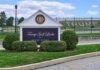 Trump Wants New Camp David for Future Presidents Entrance sign at a golf course with manicured shrubs