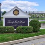 Trump Wants New Camp David for Future Presidents Entrance sign at a golf course with manicured shrubs