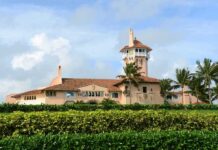 Mar-a-Lago Gets Missile Defenses as Trump’s Security Costs Grow Mediterranean-style seaside mansion with tower and palm trees
